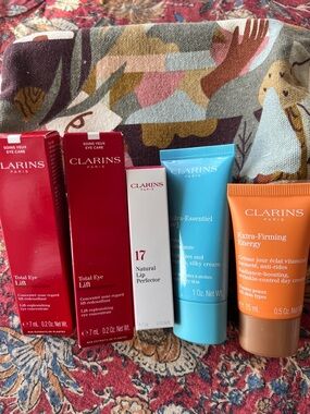 Clarins set of 5 products and cosmetic bag